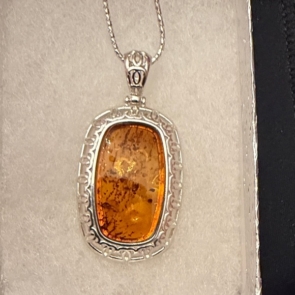 Jewelry - Elegant Silver and Amber Pendant Necklace